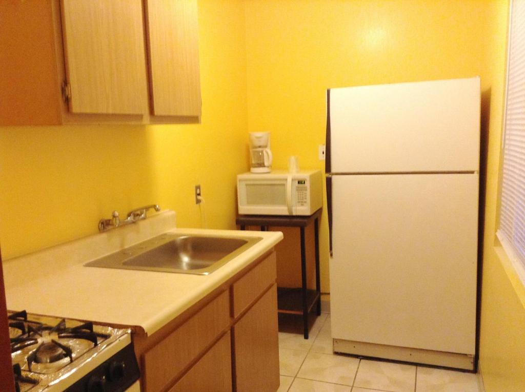 Oceanside Inn & Suites Quarto foto